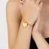 Bracciale Donna Luca Barra Rigido In Acciaio Dorato Con Cuore 7 - Verre Gioielli Bracciale Donna Luca Barra Rigido In Acciaio Dorato Con Cuore 3 Verre Gioielli - l'istituzione del gioiello