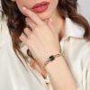Bracciale Donna Unoaerre In Ottone Dorato E Cristallo Grigio Joya 2 Verre Gioielli - l'istituzione del gioiello